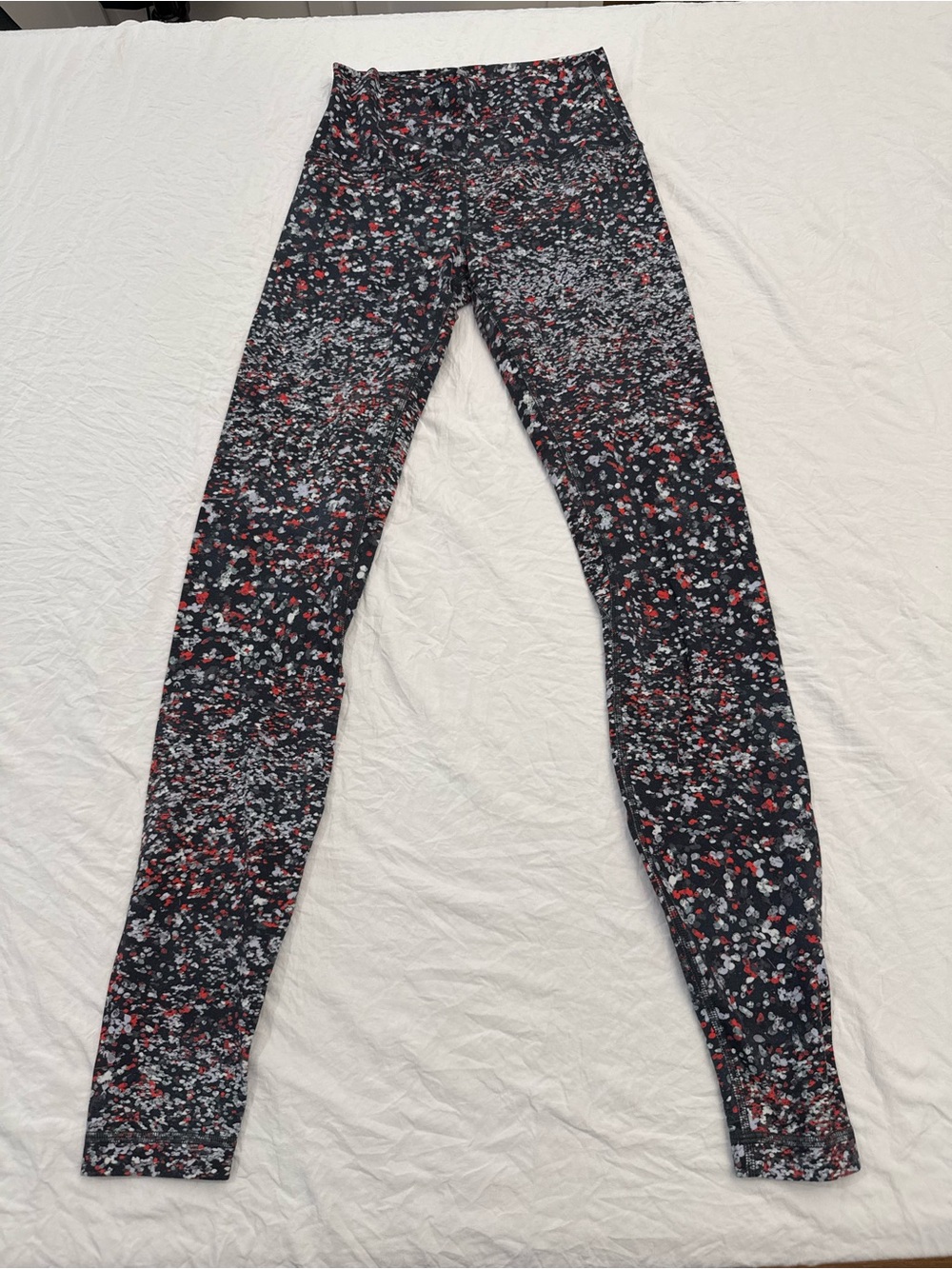 lululemon athletica Black Leggings with Red and White Speckle Print, size 4